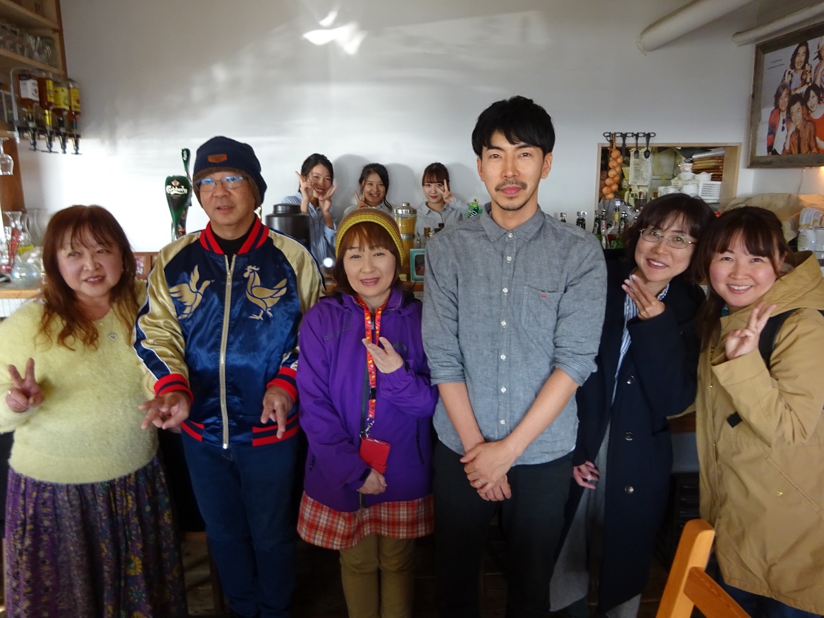 Kei Asami owner, Tomo-chan, Rico-chan with smile